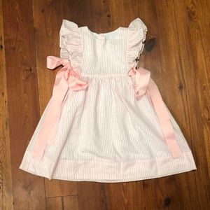 Pink Smocked threads dress by Cecil and Lou